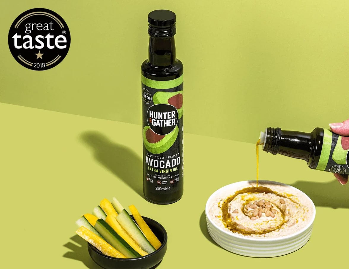 cold-pressed-extra-virgin-avocado-oil-pour-onto-hummus-min